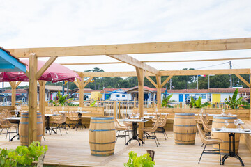 Restaurants and bar by the ocean with wooden outdoor structures are like paradises