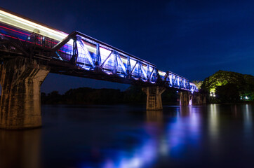 Train bridge with light streaks
