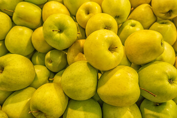 green apples on the counter on the market close up