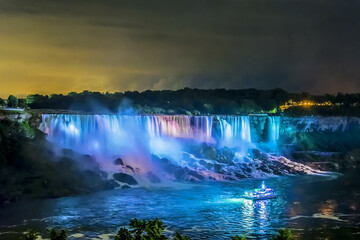 Niagara Falls close-up panorama by night. Ontario, Canada.