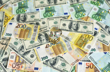 Globe on the desk and euro and dollar banknotes. Money and globus on the desk. Travel and money concept
