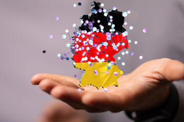 Abstract of germany map network in hand
