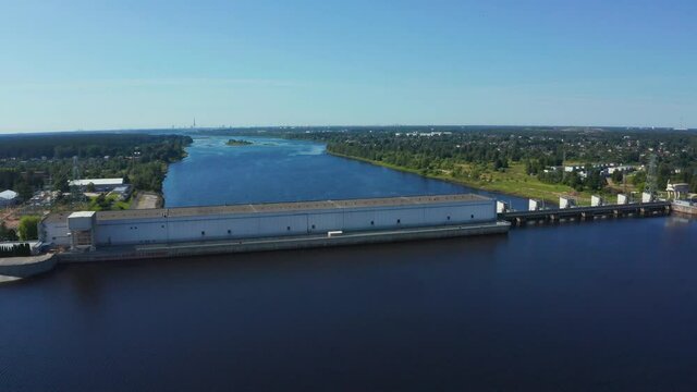 Aerial view of the huge dam in Latvia near city of Salaspils and Riga. A huge reservoir of water and river Daugava.