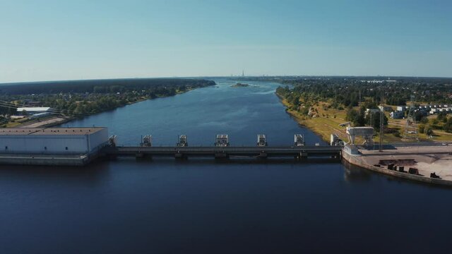 Aerial view of the huge dam in Latvia near city of Salaspils and Riga. A huge reservoir of water and river Daugava.