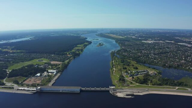 Aerial view of the huge dam in Latvia near city of Salaspils and Riga. A huge reservoir of water and river Daugava.