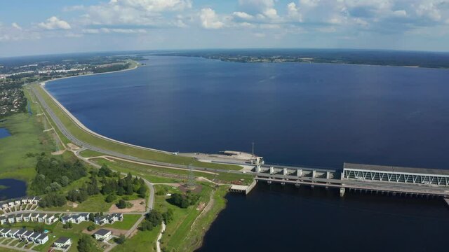 Aerial view of the huge dam in Latvia near city of Salaspils and Riga. A huge reservoir of water and river Daugava.