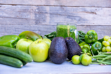 Different type of vegetables and fruits with healthy smoothie