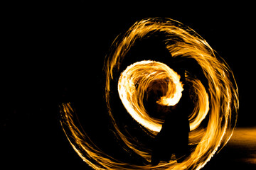 Amazing traditional fire dancing show at night in Thailand