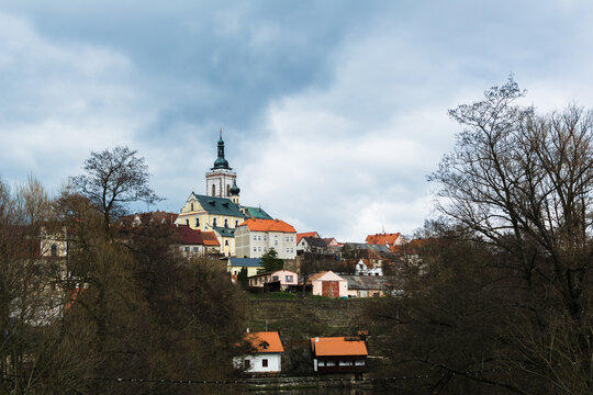 Stribro Czech. German Mies is a city in the west of the Czech Republic, in the Tachov region. Temple against the background of the sky and sun glare. Blue colour.