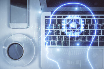 Double exposure of brain drawing hologram over topview work table background with computer. Concept of big data.