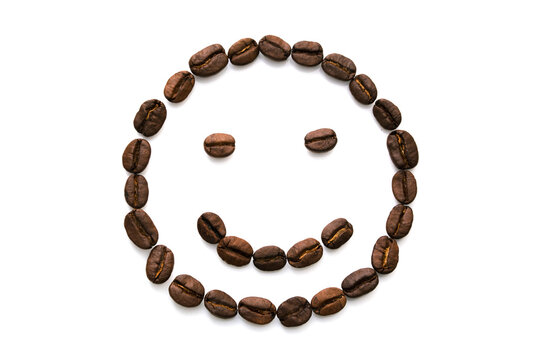 Image of a fun smiley face from a variety of coffee beans