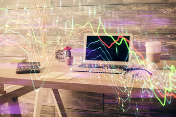 Double exposure of financial graph drawing and office interior background. Concept of stock market.