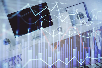 Double exposure of financial graph drawing and office interior background. Concept of stock market.