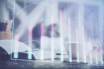 Multi exposure of forex graph drawing and desktop with coffee and items on table background. Concept of financial market trading