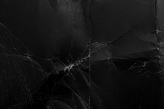 Shabby Black Paper With Creases And Dust. Damaged Packaging Old Material. Abstract Background. Macro Shot