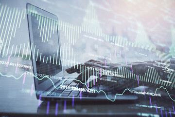 Double exposure of woman hands typing on computer and forex chart hologram drawing. Stock market analysis concept.