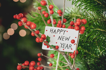 christmas and happy new year card with red berries