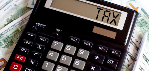 Calculator with the word TAX on the display