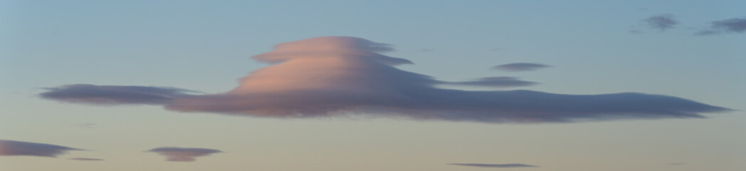 clouds in the sky making shapes, figures and drawings of various colours