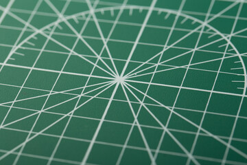 Detail of green cutting mat close up shot.