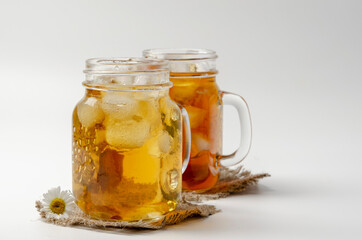 two different herbal Iced tea. blooming Sally and chamomile tea.