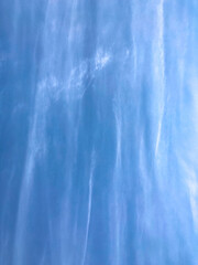 Beautiful blue sky and elongated white clouds