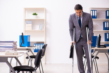 Leg injured employee in the office