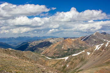 Fototapeta premium mountain landscape in the rockies, Thunder Clouds Rolling into the Mountains, Summer Mountain Views, Cloudy Mountain Days
