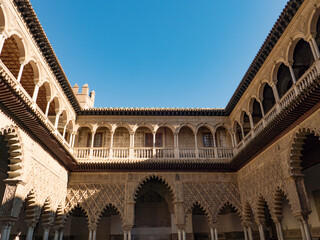 Fototapeta na wymiar The Royal Alcázars of Seville, historically known as al-Qasr al-Muriq and commonly known as the Alcázar of Seville, is a royal palace in Seville, Spain, built for the Christian king Peter of Castile