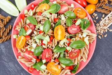Fresh salad with wholegrain pasta and vegetables. Healthy lifestyles and nutrition