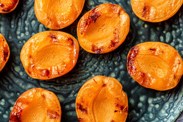Summer dessert. Ripe grilled peaches with honey. Top view. Food recipe background. Close up