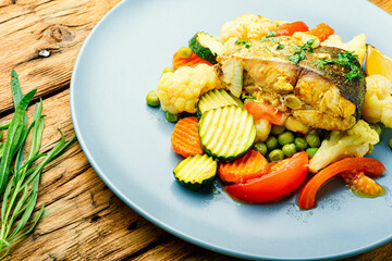 Baked fish with vegetables