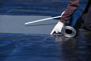 Measurement of roofing material © deviddo