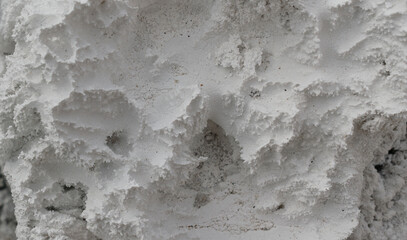 Embossed white texture for the heel backdrop. Abstract splashes, jagged and sharp edges.