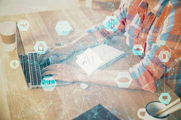 Businessman with computer background with technology theme hologram. Concept of big data. Double exposure.