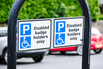Disabled blue badge holder parking sign for driver 