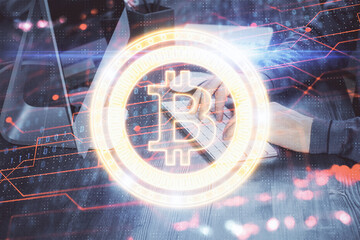 Blockchain theme hud with businessman working on computer on background. Concept of crypto chain....