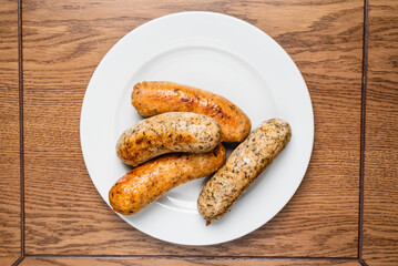 sausages on the white plate