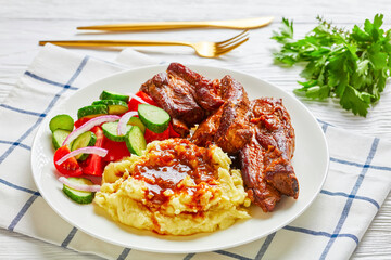 Restaurant meal: mashed potatoes with pork ribs