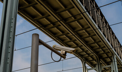 Naklejka premium Security camera mounted under a bridge