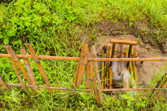 Water Flowing From Irrigation Pipe