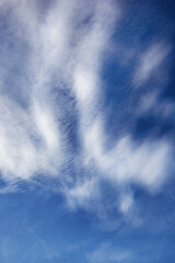 Blue sky background with white high clouds Altostratus, Cirrocumulus, Cirrus.