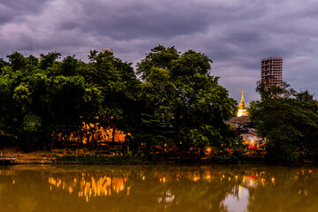 Temple building lit up in night sky
