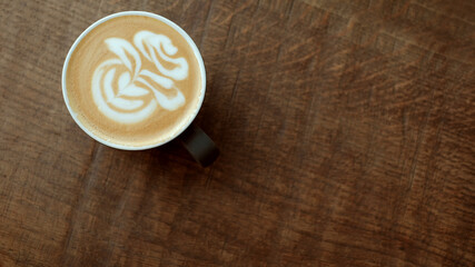 Cup of coffee with latte art on top
