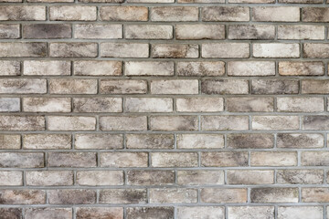 Close brown brick wall.