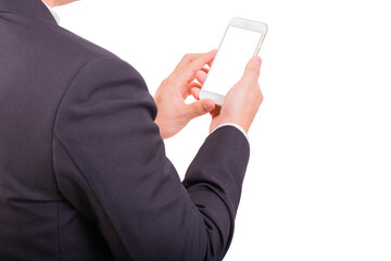 Businessman use smart phone while hand holding new smartphone and looking white background, rear view. Business concept.