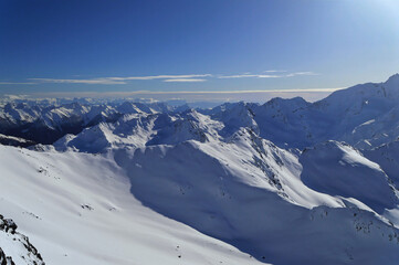 Fototapeta premium Austrian Alps covered with fresh snow during sunny winter day in Obergurgl, Austria.