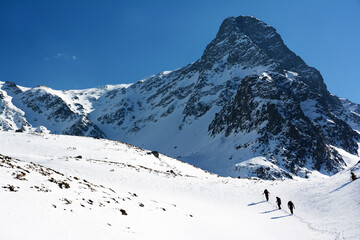 Trekking in harsh winter condition. Winter alpine landscape