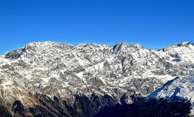 Dolomites mountains in Bormio region on sunny winter day in Bormio, Italy.
