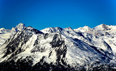 Dolomites mountains in Bormio region on sunny winter day in Bormio, Italy.